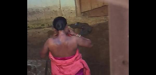  Desi village horny bhabhi nude bath show caught by hidden cam